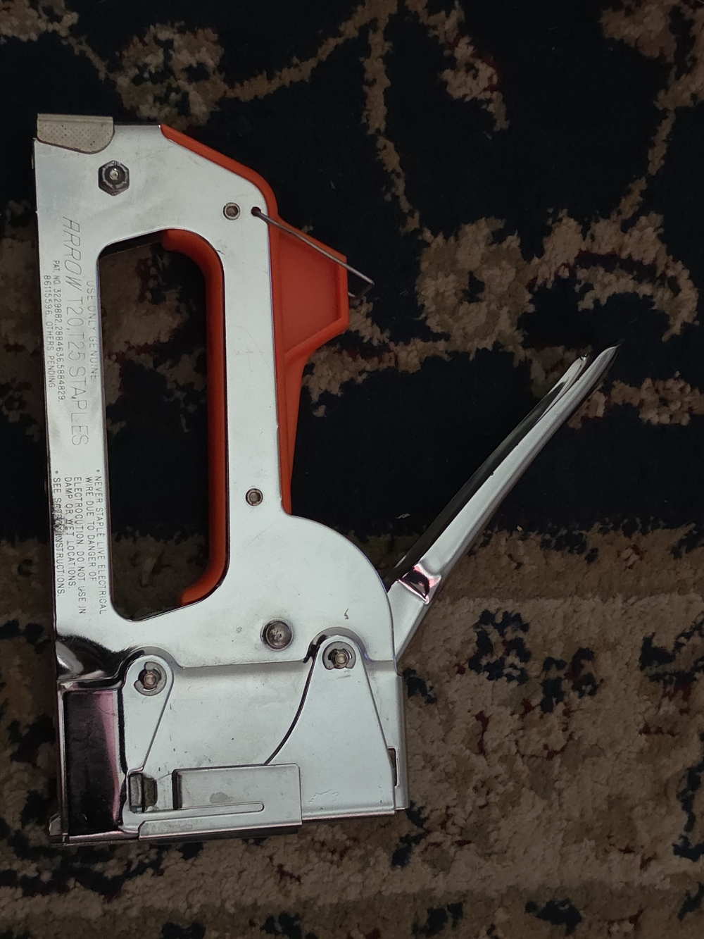 Heavy-Duty Silver and Orange Staple Gun - Durable Manual Tacker